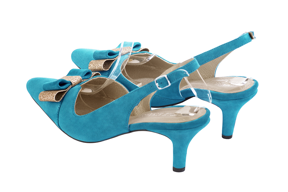 Women's turquoise blue and gold elegant slingback heels, with a bow on the front. Tapered toe. Medium slim heel - Rear view